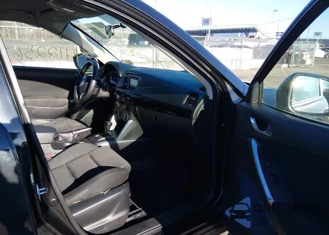 2013 Mazda Cx-5 Touring z USA, uszkodzony, nr VIN JM3KE2CE1D0145977